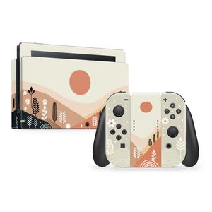 May include: A beige and brown Nintendo Switch console and controller skin with a minimalist landscape design. The design features a stylized sun, hills, and plants in a muted color palette.