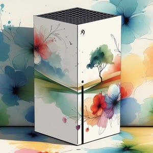 May include: A white Xbox Series X console with a colorful watercolor design featuring flowers, a tree, and a green and brown landscape. The design has a faded, vintage look.