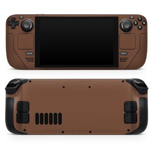 May include: A brown handheld gaming device with a black screen, buttons, and joysticks. The device has a textured brown finish and a black trim. The device is shown from the front and back.