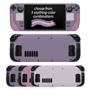 May include: A purple handheld gaming device with a screen that says "choose from 3 soothing-color combinations". The device has a black and white button layout and a purple and black color scheme. The device is shown in three different color variations: purple, pink, and a lighter shade of purple.