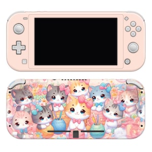 May include: A pink Nintendo Switch Lite console with a matching patterned cover. The cover features a colorful illustration of cartoon kittens with bows, yarn, and flowers. The console has a black screen and control buttons.