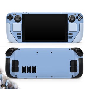 May include: A light blue handheld gaming console with a black screen and black buttons. The console has a light blue body with black accents on the grips and buttons. The top and bottom views are shown.