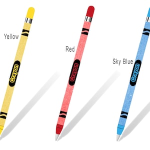 May include: Three Apple Pencil skins with a crayon design. The skins are yellow, red, and sky blue. Each skin has the word "Crayon" printed on it.