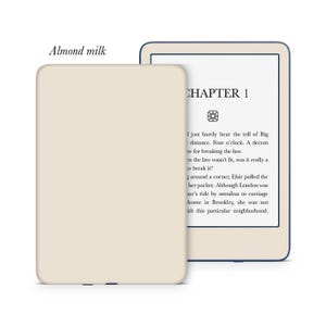 May include: A close-up of an e-reader displaying the text "CHAPTER 1" and a passage about a woman named Elsie who is walking in London. The e-reader is on a beige background.