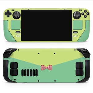 May include: A green and yellow gaming console with a red bow tie design. The console has a screen, buttons, and a speaker.