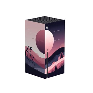 May include: A pink and purple landscape design with a large moon and a small tree. The design is printed on a black Xbox Series X console skin.