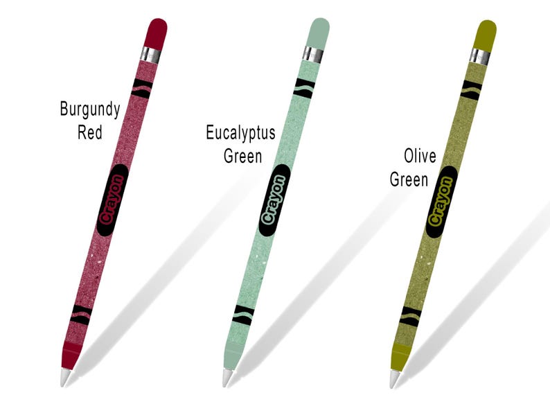 May include: Three Apple Pencil skins with a crayon design. The skins are in burgundy red, eucalyptus green, and olive green. Each skin has the word "Crayon" printed on it.
