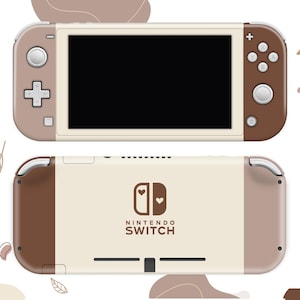 May include: A brown and beige Nintendo Switch console with a heart design and the text "NINTENDO SWITCH".