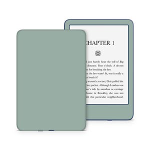 K&ouml;nnte beinhalten: Ein digitales Leseger&auml;t mit hellgr&uuml;ner H&uuml;lle und einem Bildschirm, der Text anzeigt. Der Bildschirm zeigt oben die Worte "CHAPTER 1" mit Text darunter. Die H&uuml;lle ist leicht versetzt.
