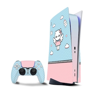 May include: A blue and pink Playstation 5 console with a white controller. The console has a design of a cartoon angel cat with wings and a pink dress. The controller has a blue and white polka dot design.