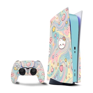 May include: A PlayStation 5 console and controller set with a pastel swirl pattern, decorated with cartoon cat faces, stars, and hearts. The console has a light blue accent, and the controller has black buttons.