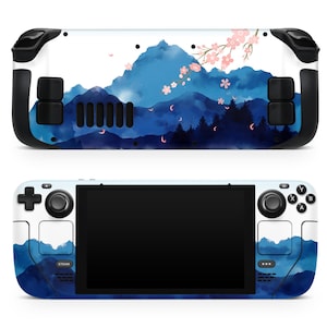 Op de afbeelding: Een blauwe en witte Nintendo Switch-console skin met een aquarel berg- en kersenbloesem ontwerp. De skin is ontworpen om te passen op de Nintendo Switch-console en bevat een bijpassende skin voor de Joy-Con-controllers.