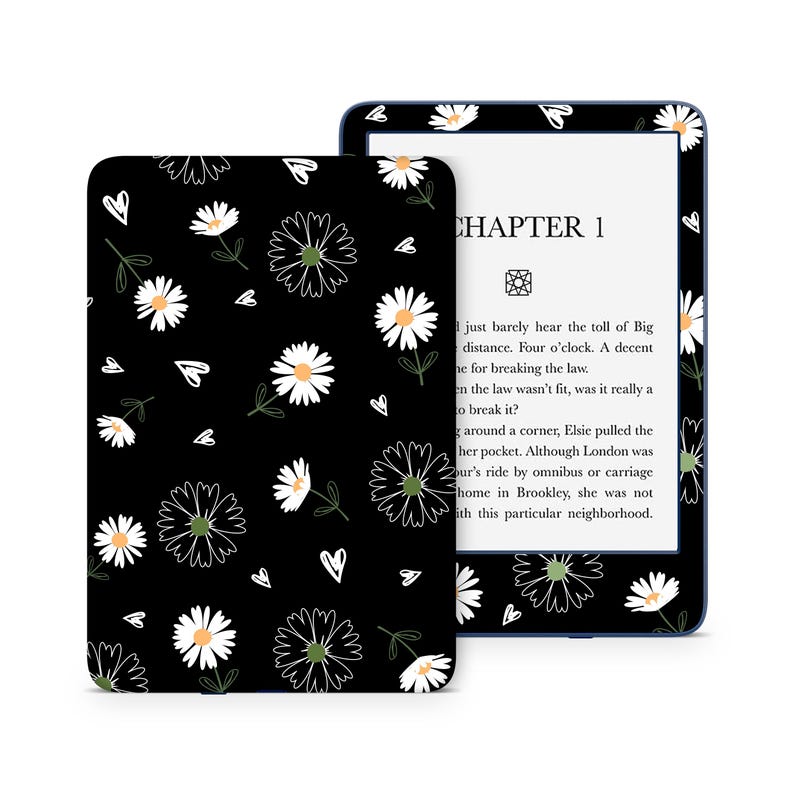 May include: A black and white floral pattern with white daisies and hearts on a black background. The pattern is on a Kindle e-reader cover. The Kindle e-reader is displaying the text "CHAPTER 1" and a short excerpt from a book.