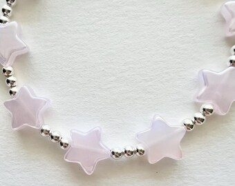 Pulsera de cuentas con estrellas iridiscentes