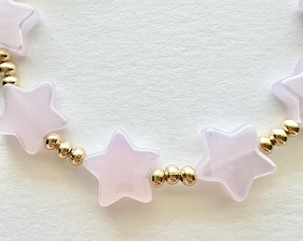 Pulsera de cuentas con estrellas iridiscentes