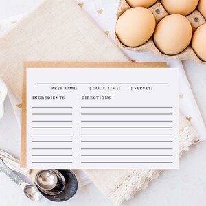 Puede incluir: Una tarjeta de receta imprimible con líneas para ingredientes, instrucciones, tiempo de preparación, tiempo de cocción y porciones.