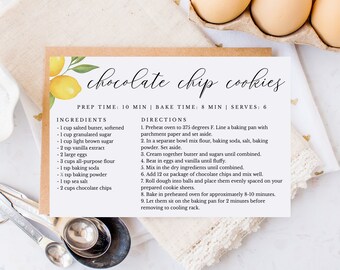 May include: A recipe card with a lemon illustration and the title "chocolate chip cookies". The card includes a list of ingredients and directions for making chocolate chip cookies. The ingredients include 1 cup salted butter, 1 cup granulated sugar, 1 cup light brown sugar, 2 teaspoons vanilla extract, 2 large eggs, 3 cups all-purpose flour, 1 teaspoon baking soda, 1/2 teaspoon baking powder, 1 teaspoon sea salt, and 2 cups chocolate chips.