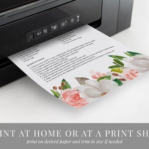 May include: Printable recipe card with a floral design featuring pink and white flowers. The recipe is for chocolate chip cookies and includes a list of ingredients and directions.