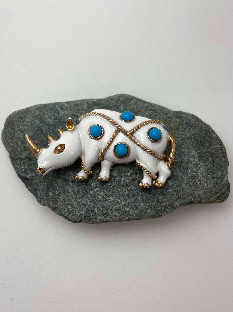 Vintage JJ white rhinoceros brooch with faux turquoise beads