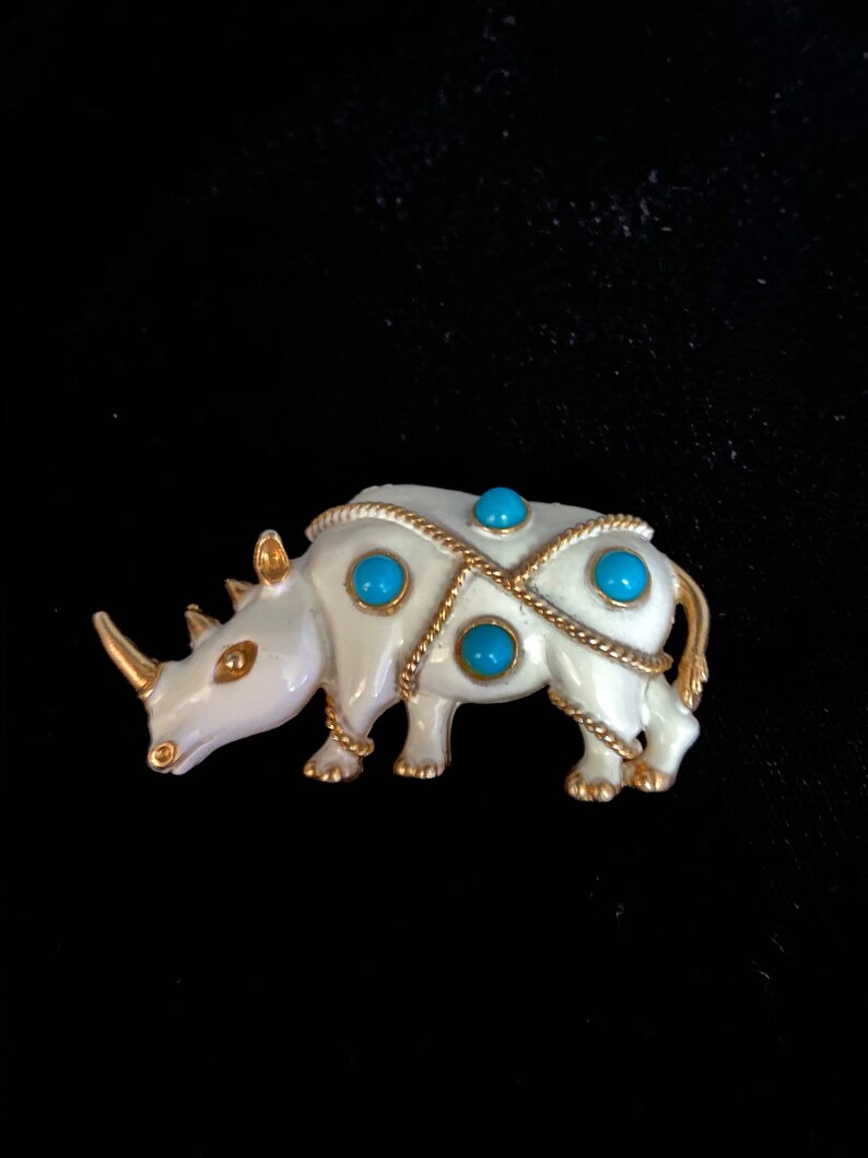 Vintage JJ white rhinoceros brooch with faux turquoise beads