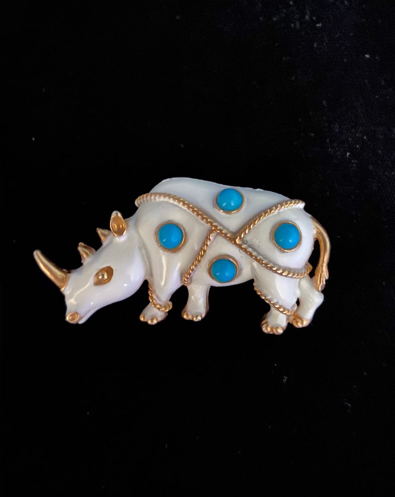Vintage JJ white rhinoceros brooch with faux turquoise beads