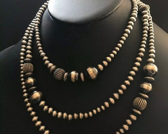 Collar de perlas de plata esterlina. 60 pulgadas.
