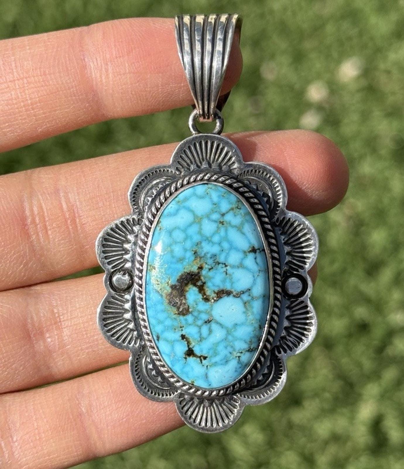 ナバホ族スターリングシルバーキングマンスパイダーウェブターコイズ