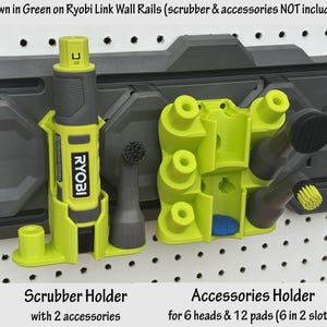 May include: Green and gray Ryobi Link Wall Rails with a scrubber holder and an accessories holder. The scrubber holder has 2 accessories. The accessories holder is for 6 heads and 12 pads (6 in 2 slots). The Ryobi logo is visible.