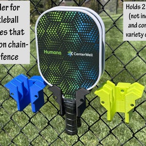 Uchwyt na 2 paletki do pickleballa do ogrodzenia z siatki łańcuszkowej – wygodnie trzymaj paletki z dala od powierzchni boiska, gdzie będziesz je widzieć