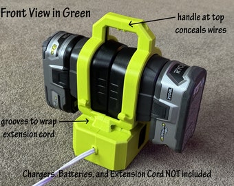 May include: Front view of a green 3D printed battery holder for two batteries. The holder has a handle at the top and grooves to wrap an extension cord. The holder is designed to hold two Ryobi 18V batteries.