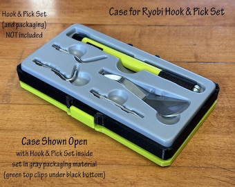 May include: Open case for a Ryobi hook and pick set. The case is green and black with a gray interior. The tools are visible inside the case.