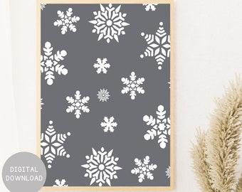 Könnte beinhalten: Ein gerahmter Druck mit einem Muster aus weißen Schneeflocken auf einem dunkelgrauen Hintergrund. Die Schneeflocken variieren in Größe und Design und erzeugen eine winterliche Ästhetik. Die Worte "DIGITALER DOWNLOAD" stehen in einem grauen Kreis unten links.