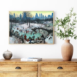 May include: A vintage painting depicting a winter scene in Central Park, New York City. People are ice skating on a frozen pond, with a bridge in the background. The cityscape is visible in the distance.