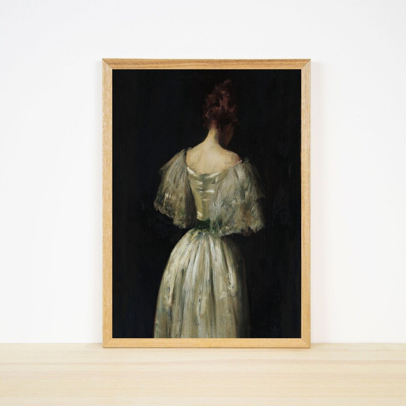 May include: A framed painting of a woman in a white dress with a green sash, standing with her back to the viewer against a dark background.