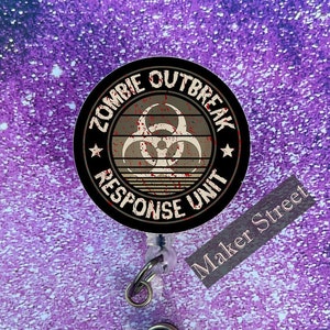 Zombies Outbreak Response Unit Badge Reel or Pin - Envío Gratis