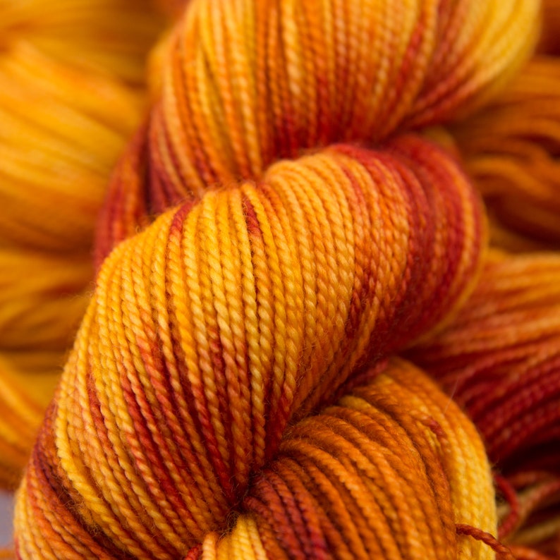 Campfire Deluxe Sock Fingering Weight Yarn red, orange and gold, Hand dyed Superwash Merino and Nylon blend image 1