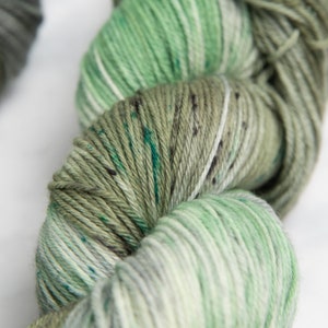 Misty Isle, Sock Fingering Weight Yarn Muted greens and greys variegated speckled Hand dyed 100% Superwash Merino image 1