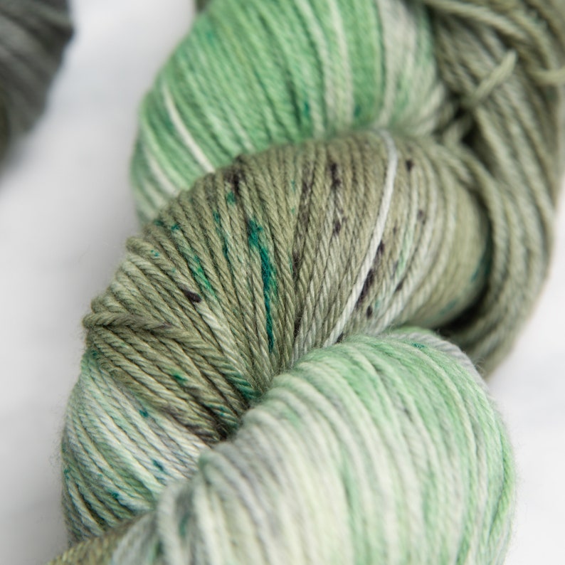 Misty Isle, Sock Fingering Weight Yarn Muted greens and greys variegated speckled Hand dyed 100% Superwash Merino image 1