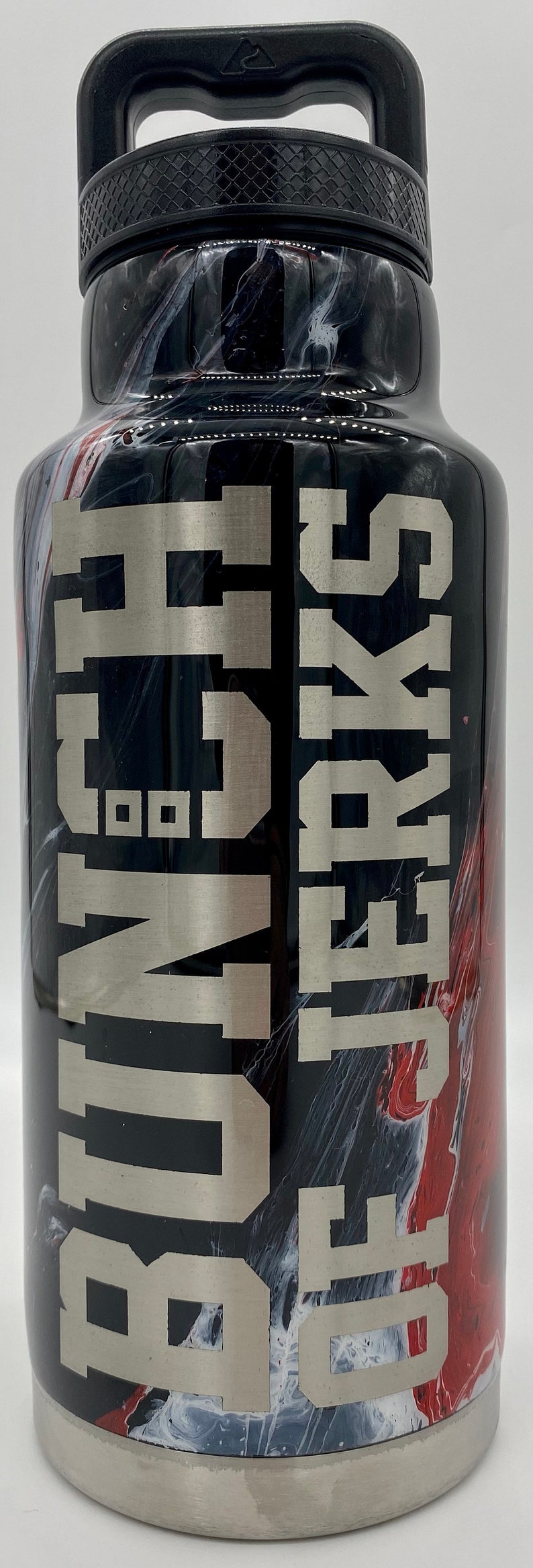 May include: A black and white marbled stainless steel water bottle with a black handle and a silver inscription that reads "BUNCH OF JERKS".