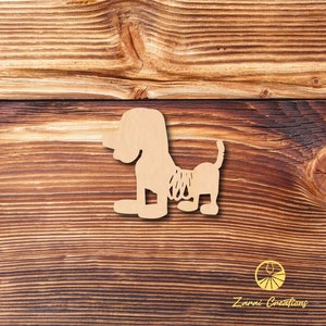 May include: A wooden cutout of a dog in a sitting position. The dog is brown and has a long tail. The cutout is on a wooden background.