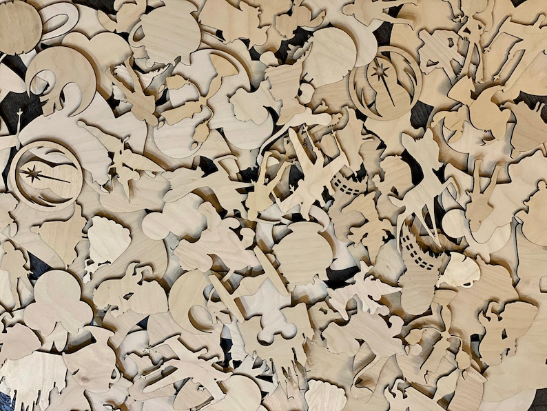 May include: A large collection of unfinished wooden shapes, perfect for crafting and DIY projects. The shapes are various sizes and include stars, hearts, circles, and more.