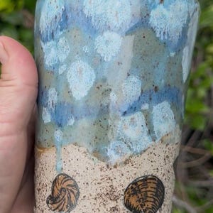 Beach-Themed Handmade Ceramic Travel Sipper | Speckled Stoneware Coffee Mug | Ocean Waves & Seashell Tumbler | Coastal Pottery Gift