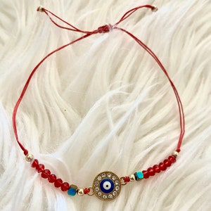 Rote Perlen Evil Eye Schutz Bettelarmband
