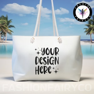 May include: White tote bag with white rope handles. The bag has the text "YOUR DESIGN HERE" printed on the front in black.