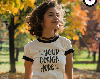 May include: White ringer t-shirt with black trim and the text "YOUR DESIGN HERE". The shirt is being worn outdoors. The image also includes the text "FREE SIZE CHART INCLUDE". The Fashion Fairy Co. logo is in the upper right corner.