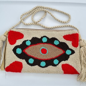 Cartera Wayuu, bolso de mano con aguja punzonada. Diseño único. Hecho a mano. Bolso de Mano Wayuu H2