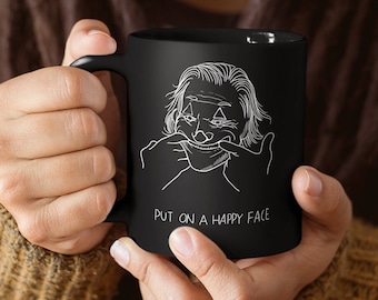 JOKER - Put On A Happy Face - Black Glossy Mug