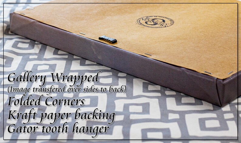 May include: Close-up of the back of a gallery wrapped canvas print. The canvas is wrapped around the sides and the image is printed on the sides. The back of the canvas is covered in brown kraft paper and has a gator tooth hanger.