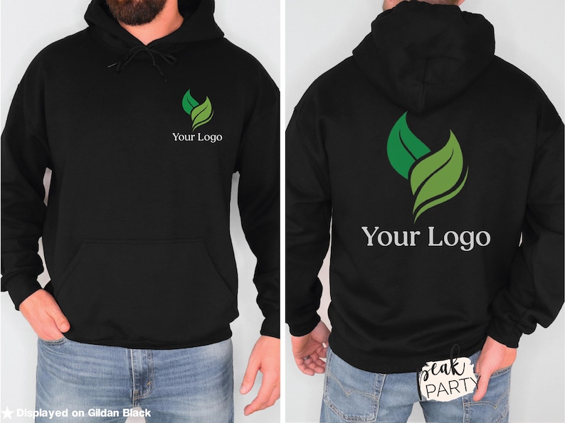 May include: Black hoodie with a front pocket and drawstring hood. The front and back of the hoodie feature a green and white leaf logo with the text "Your Logo" below it. The hoodie is displayed on a person.