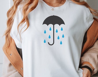 When It Rains - Unisex t-shirt, regenachtige dag, grappig T-shirt, eigenzinnig paraplushirt, parapluafbeelding
